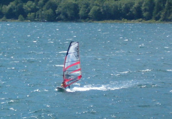 Declan with youngster on front of board
