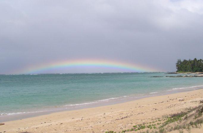 Under the rainbow are dozens of sailors at Sprecks
