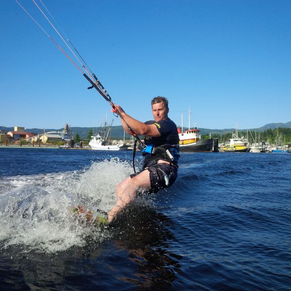 kitesurferDale coming in at fingers:HQ pier
getting splashed, while laying in the sun on the dock at HQ pier
