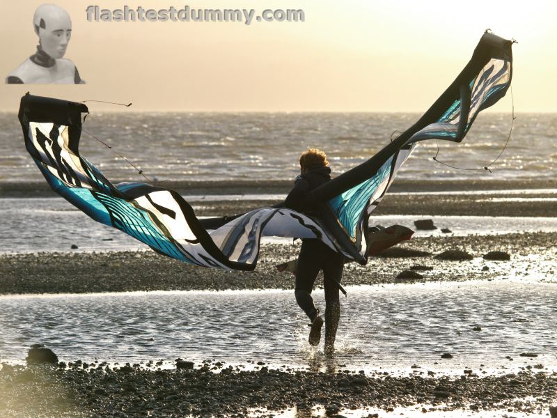 Hellish wind, sun going down, Wade going kiting.
How is kiting spelled?  And how do I keep my fingers warmer?
